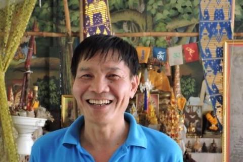 Thai man in traditional massage school