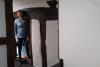 There are steps into some rooms and low doorways